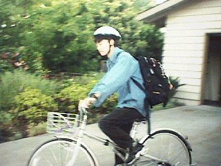 Takeshi is riding a bike